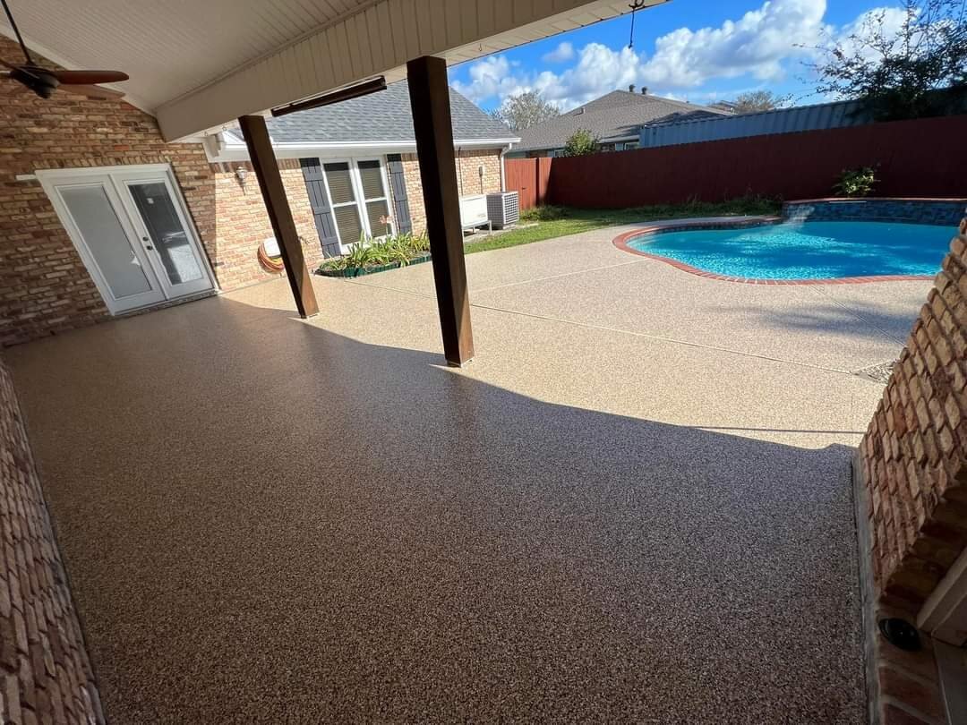 Decorative Endura coating on a backyard patio and pool area