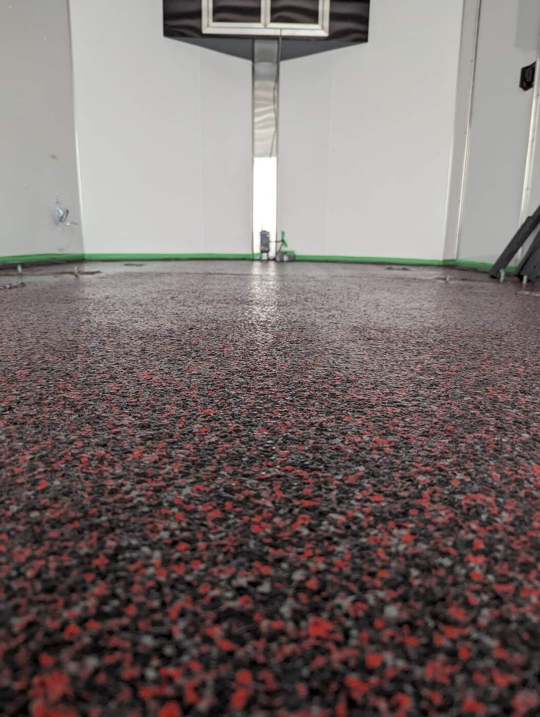 Red and black decorative flake epoxy floor