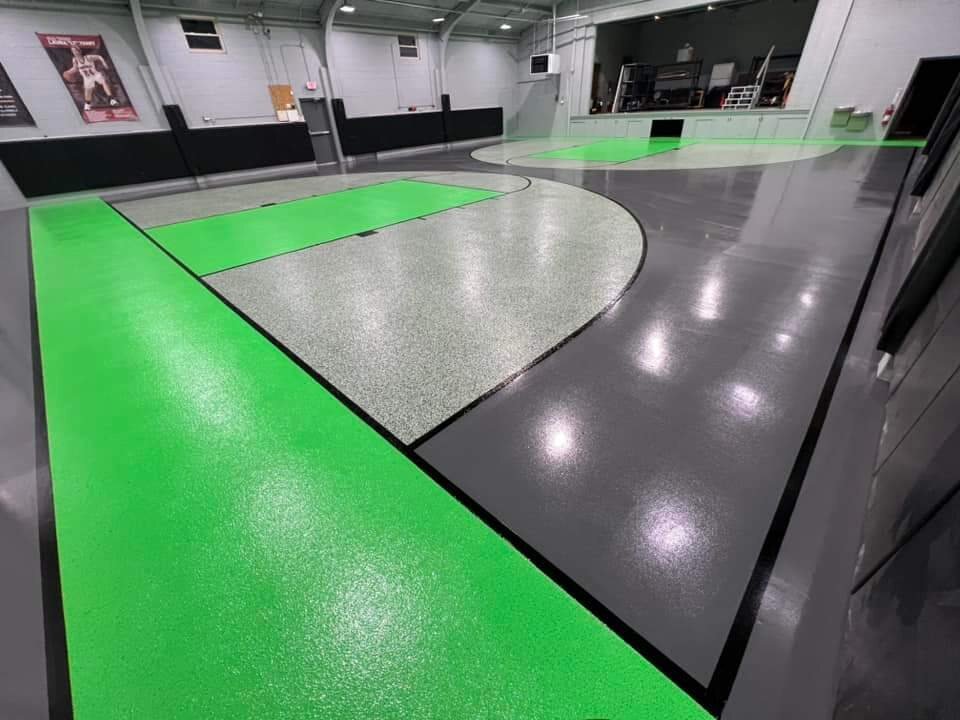 Decorative gray and green epoxy recreation floor