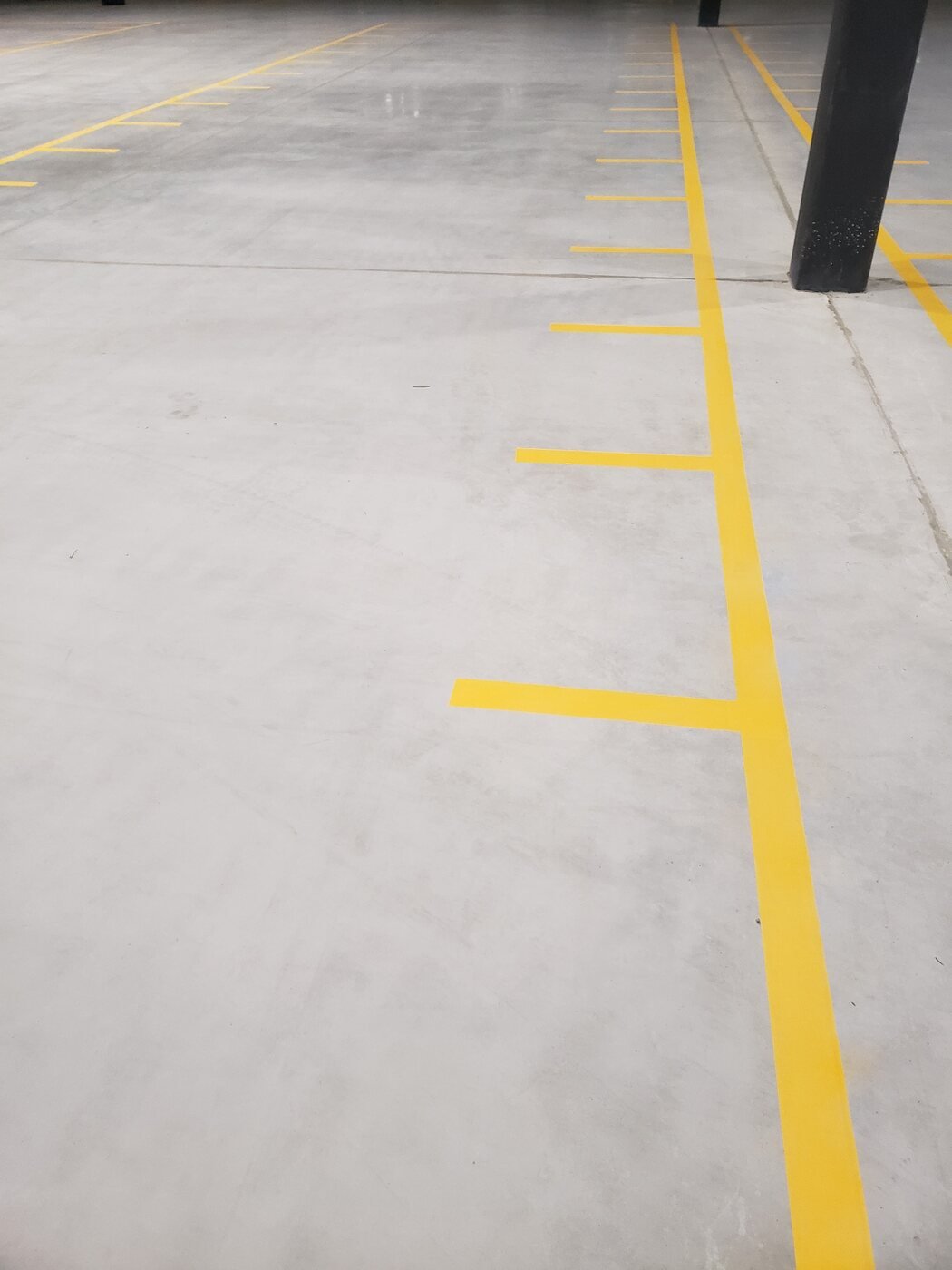 Industrial coating with yellow traffic and safety lines