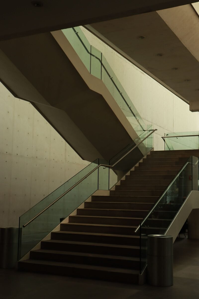 Modern glass and metal railing installation