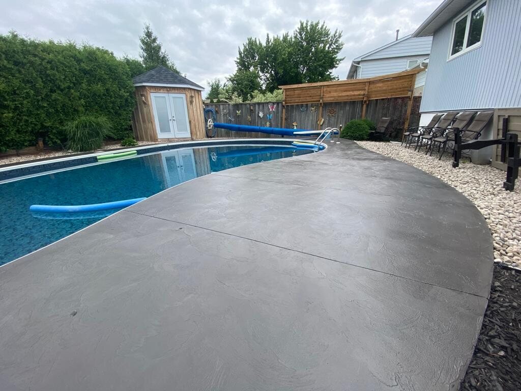 Smooth microcement pool-deck finish