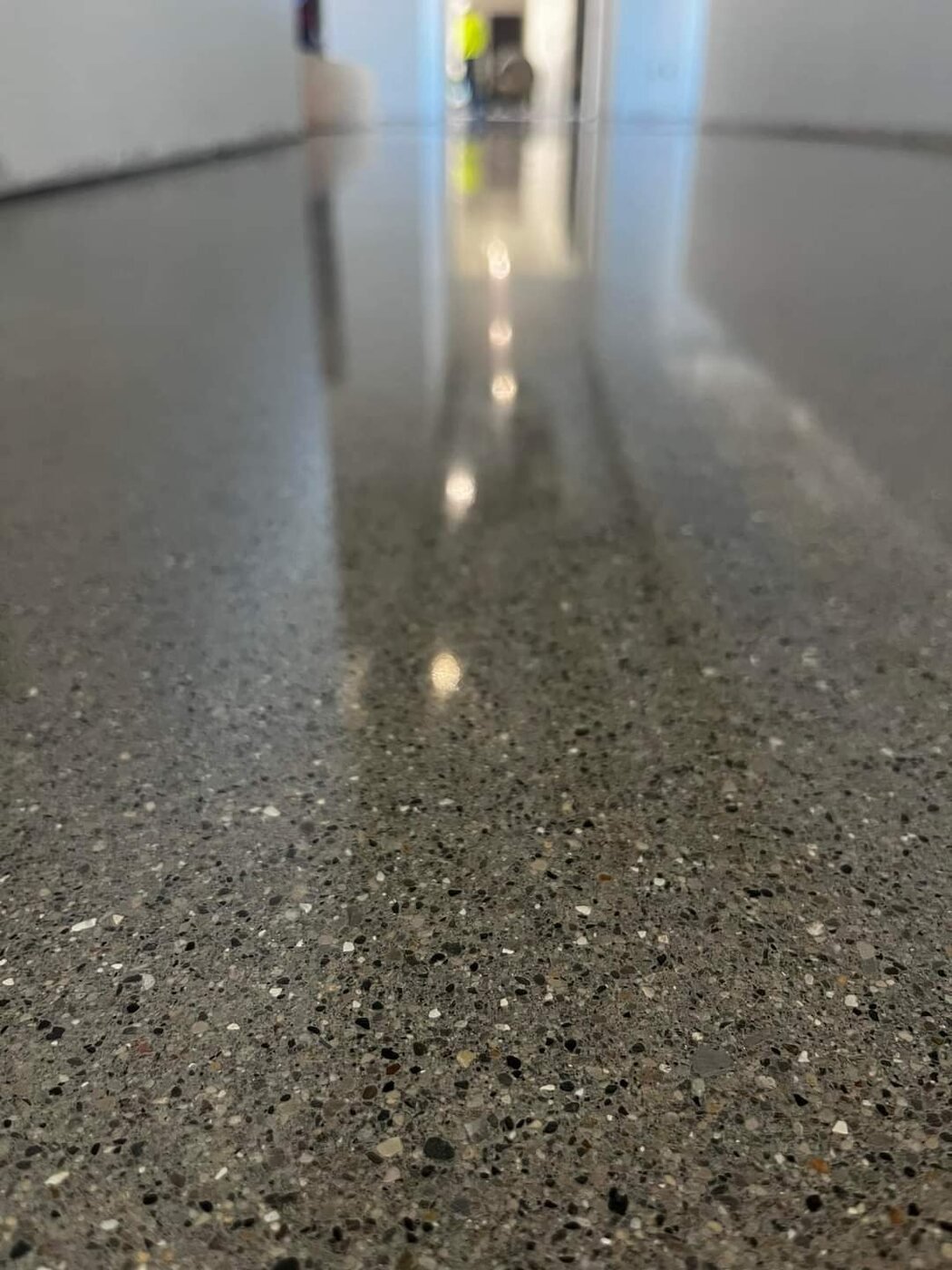 Close view of a reflective polished concrete finish